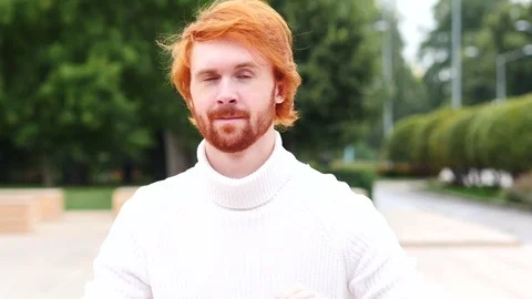Heart Sign by Man with Red Hairs, Outdoor Stock Footage