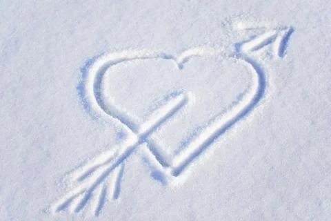 Heart on the snow Stock Photos