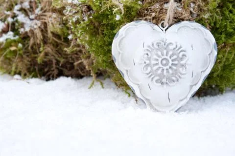 Heart in snow Stock Photos