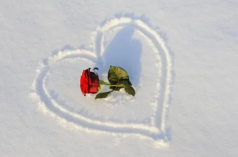 Heart in snow Stock Photos