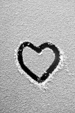 Heart in the snow Stock Photos