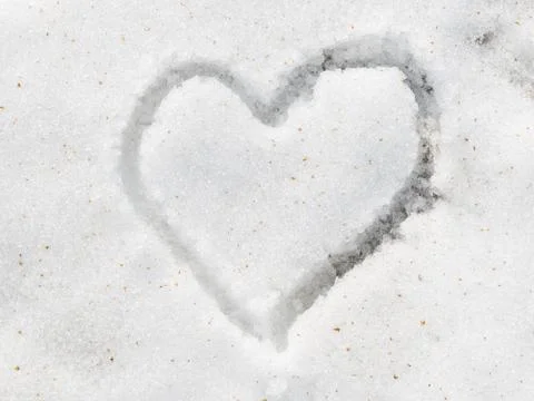 Heart on the snow Stock Photos