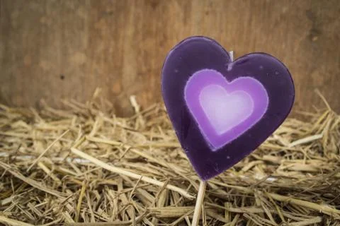 Heart on straw Stock Photos