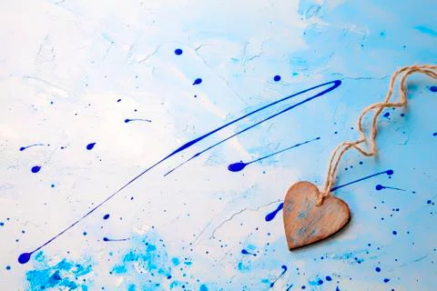 Heart on a string,background blue, Stock Illustration