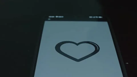 Heart symbol beating, presentation on smartphone Stock-Footage 309457648