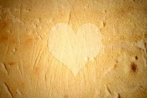 Heart on the wall background Stock Illustration