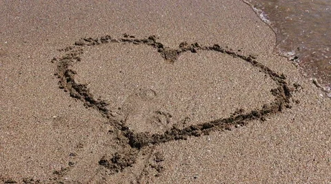 Heart washed by waves Stock Footage 41421224