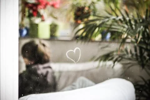 A heart on the window Stock Illustration