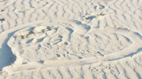 A heart written in the sand. Video stock 42891730
