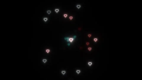 Heartbeat shapes moving in a circular path on a dark Stock Footage 339294653