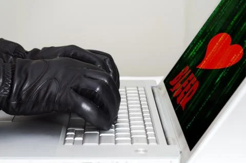 Heartbleed exploit concept with hands wearing black gloves Stock Photos