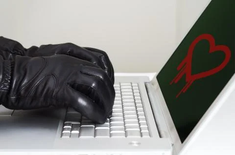 Heartbleed exploit concept with hands wearing black gloves Stock Photos