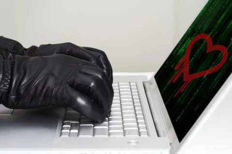 Heartbleed exploit concept with hands wearing black gloves Stock Photos