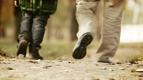 Heartiness words to dear daddy during walk in autumn park Stock Footage 32303029