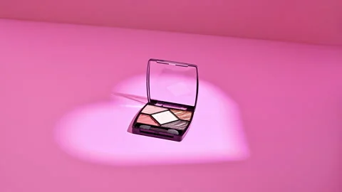 Heartlit Elegance: Stop Motion Eye Shadow Palette on Pink Canvas Stock Footage 258259427
