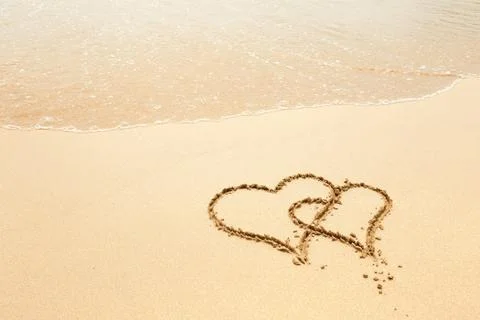 Hearts on the beach Stock Photos