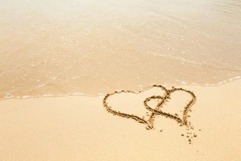 Hearts on the beach Stock Photos