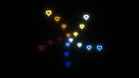 Hearts in different colors forming patterns on a dark Stock Footage 338276831