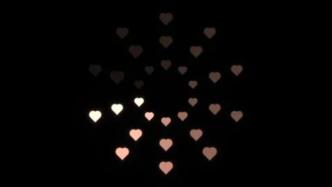 Hearts floating in dark space creating a pattern of light Stock Footage 339304098