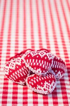 Hearts on gingham tablecloth Stock-Fotos