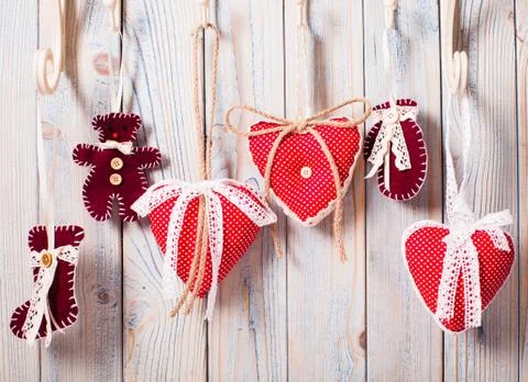 Hearts on hooks Stock Photos