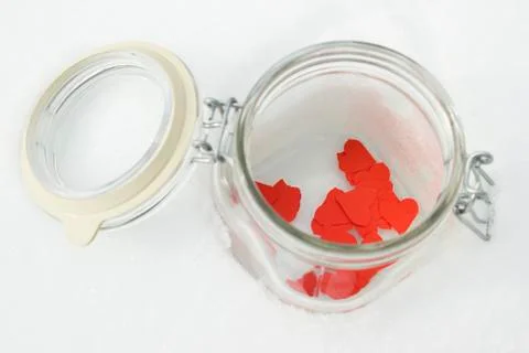 Hearts in jar Stock Photos