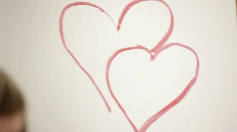 Hearts on the mirror. HD Video stock 10574394