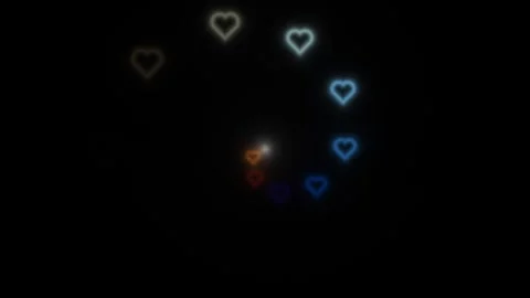 Hearts moving in various colors on black background Stock Footage 338277560