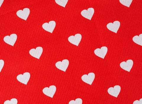 Hearts on red background Hearts pattern on red fabric texture background. ... Stock Photos