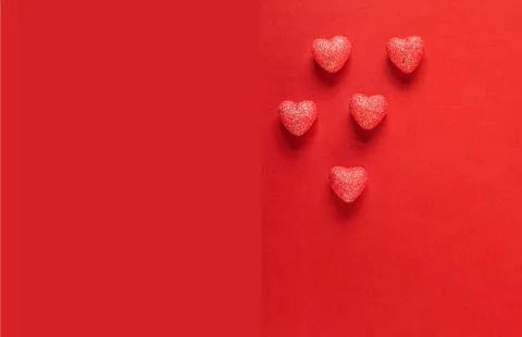 Hearts on red background. Stock Photos