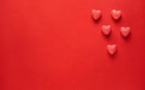 Hearts on red background. Foto stock