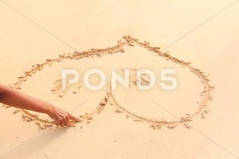 Hearts in the sand Stock Photos