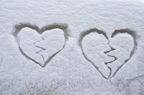 Hearts shape in the snow Stock Photos
