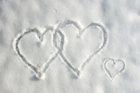 Hearts in snow Stock Photos