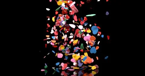 Hearts for Valentine's Day Party Exploding on Black Background Stock Photos