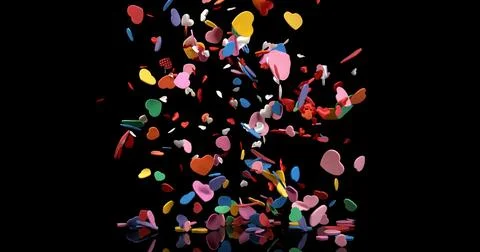 Hearts for Valentine's Day Party Exploding on Black Background Stock Photos