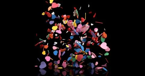 Hearts for Valentine's Day Party Exploding on Black Background Stock Photos