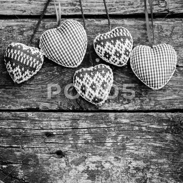 Hearts on wooden background Stock Photos