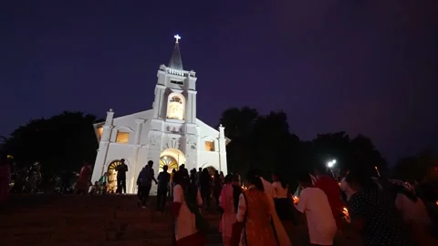 Heartwarming act of devotion with candles Stock-Footage 259557574