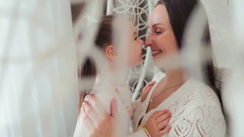 Heartwarming and Tender Moments Shared Between a Loving Mother and Her Daughter Stock Footage 317957554