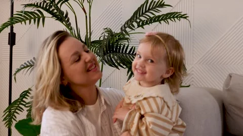 Heartwarming Moments Shared Between a Loving Mother and Her Cherished Child Stock Footage 312195989