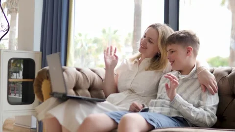 A Heartwarming Video Call Between Mom and Son Joyful Moments Shared Together Stock Footage 317005716