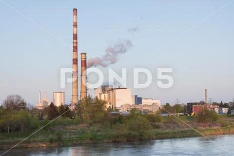 Heat and power plant river chimneys 05 Stock Photos