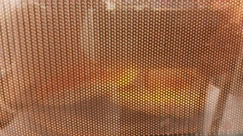 Heat bread in the microwave to thaw Stock Footage 145753960