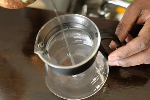 Heat up the coffee server Stock Photos