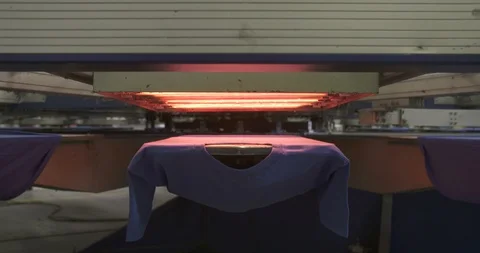 Heat Drying at a Silk Screen Printers Stock Footage 88564860