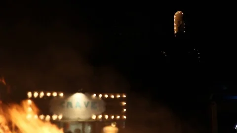 Heat from the fire blurring the Crave sign Stock Footage 122802552