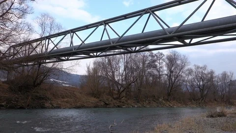 Heat pipe over the river Video stock 107780244