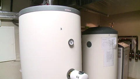 Heat pump and ventilation system in modern passive house boiler room Video stock 103862873