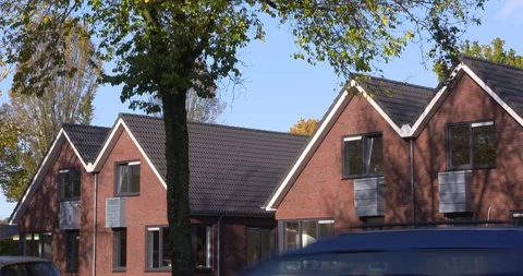 Heat pump fan units integrated on the facade of new-build new-build homes Stock Footage 120131211